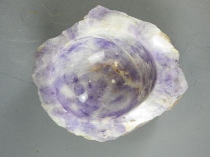 Reunion of a hand-polished rose quartz ashtray...