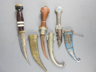 Five oriental daggers. Metal, horn, wood,...