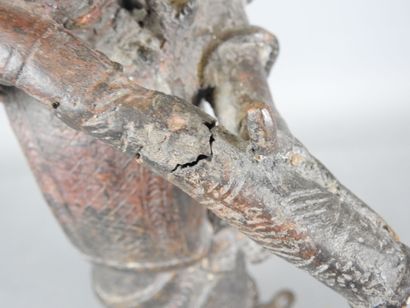 BENIN: Statue of a messenger blowing into...