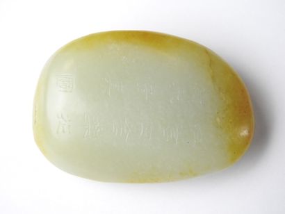 CHINA: Nephrite jade pebble with engraved...