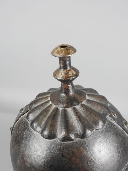 CHINA. Fancy helmet in patinated iron with...