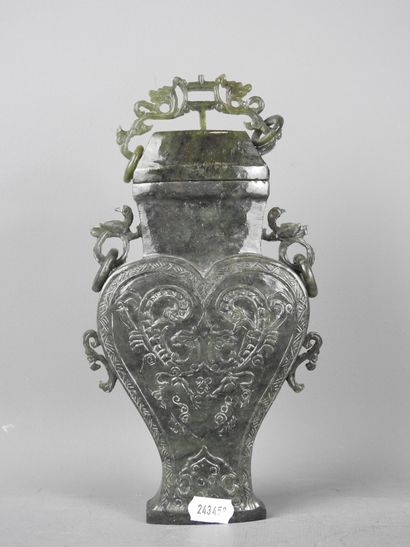 CHINA: Spinach-green jadeite stone covered...