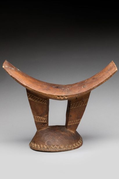 DAN, Ivory Coast. Carved and scarified hardwood,...