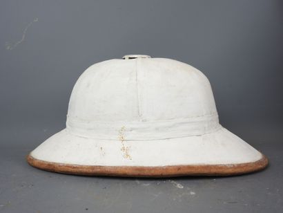 White colonial helmet with brown piping....