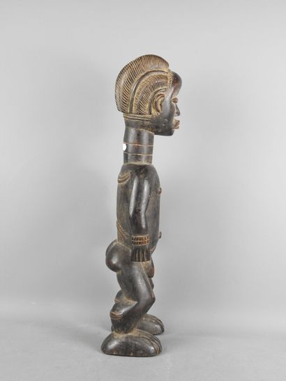 Ivory Coast. Hard wood with black-brown patina....