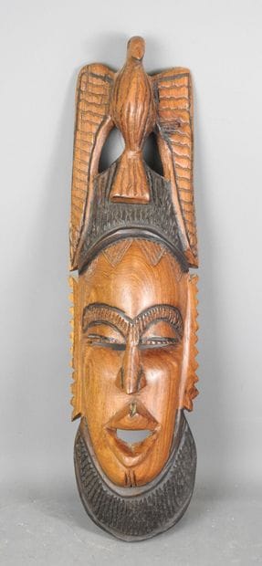 AFRICA: Wooden tribal mask with brown and...