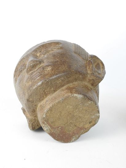 CAMBODIA: Stone head forming a box or mortar...