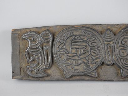TIBET: Wooden xylographic board used to print...