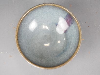 CHINA: Stoneware bowl with flamed glaze....