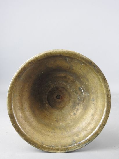 ORIENT: Gilt bronze candlestick with incised...