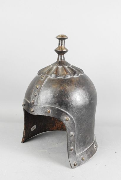 CHINA. Fancy helmet in patinated iron with...