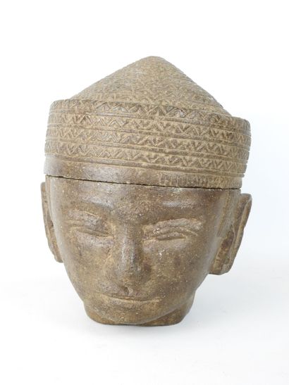 CAMBODIA: Stone head forming a box or mortar...
