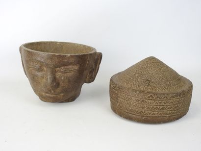 CAMBODIA: Stone head forming a box or mortar...