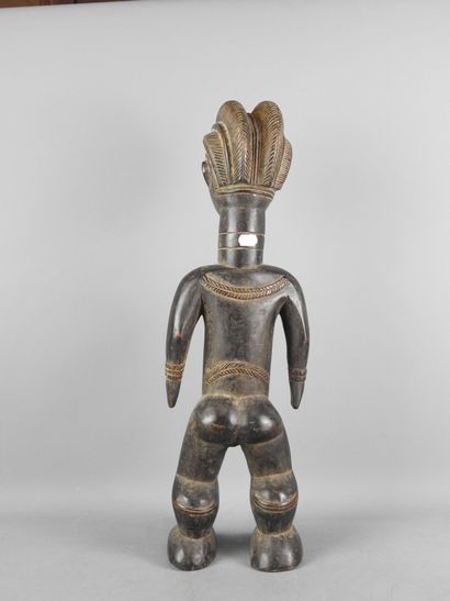 Ivory Coast. Hard wood with black-brown patina....