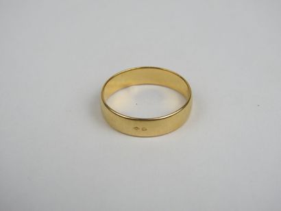 Wedding band in 750 thousandths gold, engraved...
