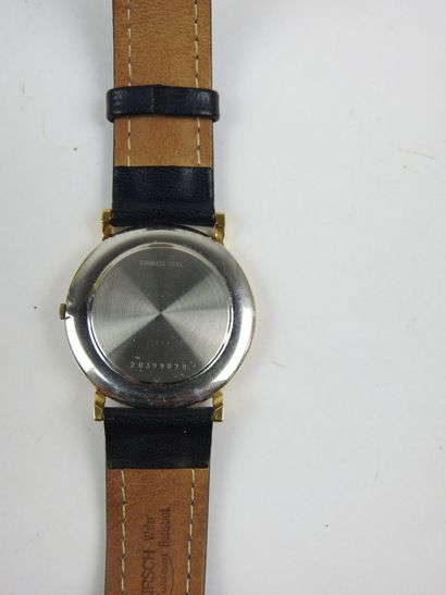 LONGINES. Gold-plated metal watch, round...