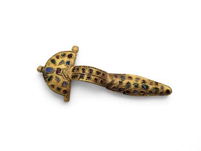 Replica of a barbarian arched fibula in gilt...