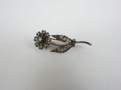 Set of three flower brooches set with pearls...