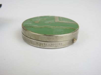 Set comprising a black enameled case with...