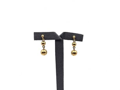 Pair of 750 thousandths yellow gold earrings...