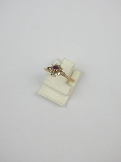 TWO RINGS in 750/1000th yellow gold and colored...