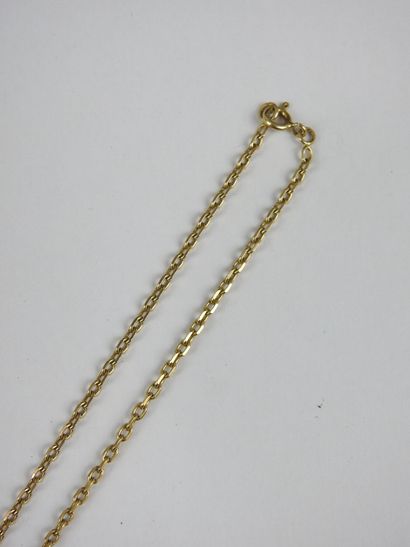 Horse pendant and chain in yellow gold 750/1000e....