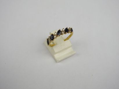 Half wedding band in 750 thousandths gold...