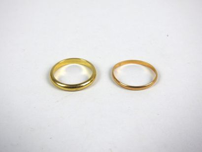 TWO ALLIANCES in 750/1000th yellow gold....