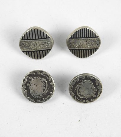 Two PAIRS OF SILVER HANDLEBUTTONS with arabesque...