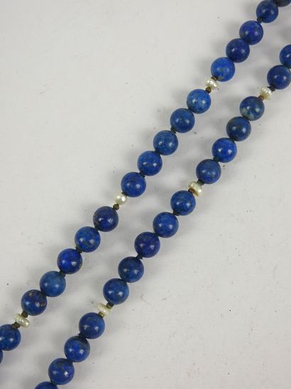 NECKLACE of lapis lazuli beads alternated...