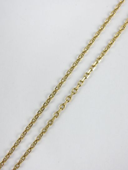 Horse pendant and chain in yellow gold 750/1000e....