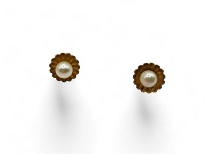 Pair of 750 thousandths yellow gold stud...