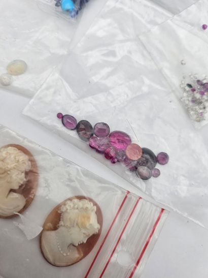 Lot of stones on paper including shell cameos,...