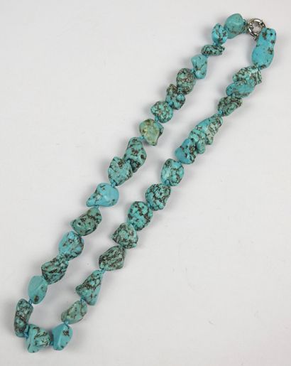 NECKLACE in polished rough turquoise. Silver-plated...