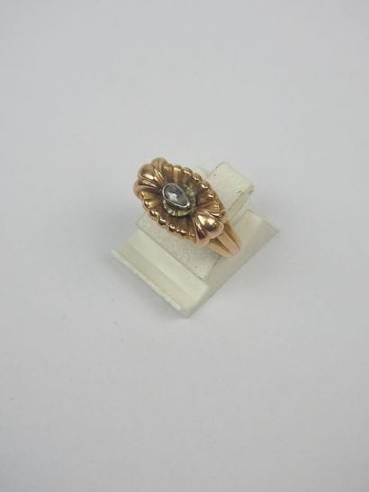 TWO RINGS in 750/1000th yellow gold and colored...