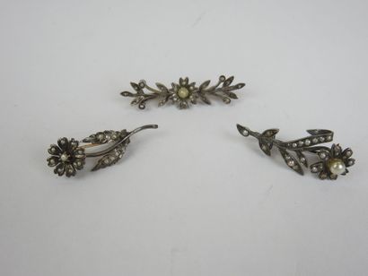 Set of three flower brooches set with pearls...
