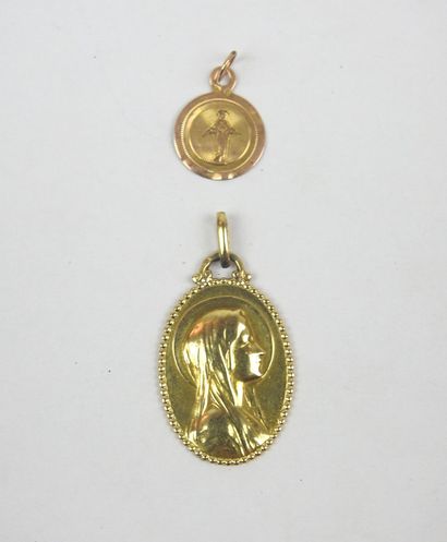 TWO religious MEDALS in yellow gold 750/1000;...