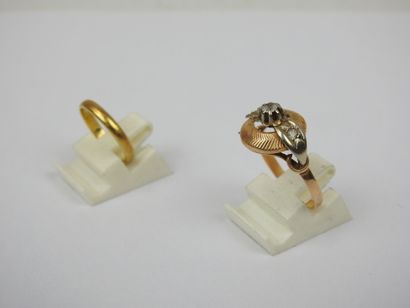 2 cut rings in 750 thousandths gold set with...