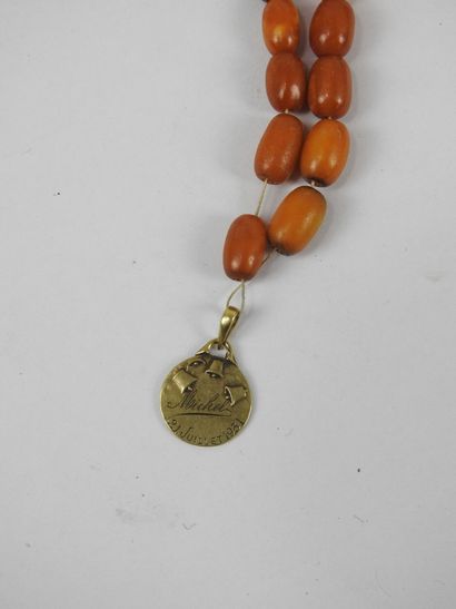 MEDALTTE in yellow gold 750/1000e engraved...