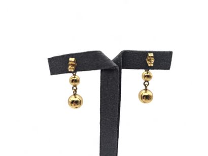 Pair of 750 thousandths yellow gold earrings...