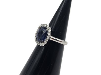 750 thousandths white gold pompadour ring...