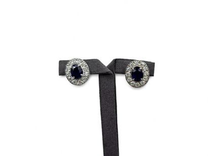 Pair of 750 thousandths white gold oval stud...