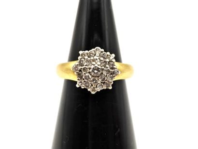 18K (750°/°°) yellow gold flower ring set...
