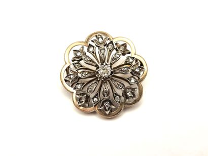 18K (750°/°°) yellow gold and silver openwork...