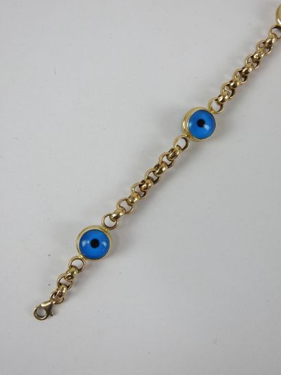 BRACELET in 14K yellow gold with glass cabochon...