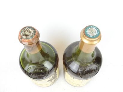 2 bottles Château-Chalon 1979. Low levels,...