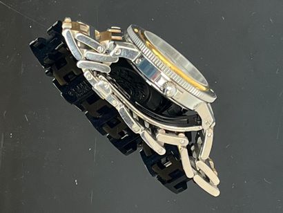 HERMES - Paris. Clipper steel and gold-plated...