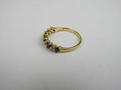 Half wedding band in 750 thousandths gold...