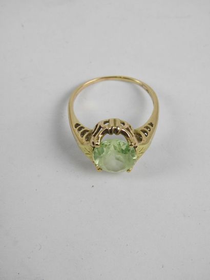 Low-titanium yellow gold and glass ring....
