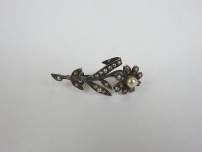 Set of three flower brooches set with pearls...